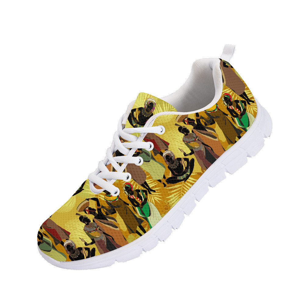 People Of South Africa In National Clothes On Gold Leaves Background Running Shoes Sport Sneakers